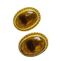 Vintage gold tone glass amber designer clip on earrings