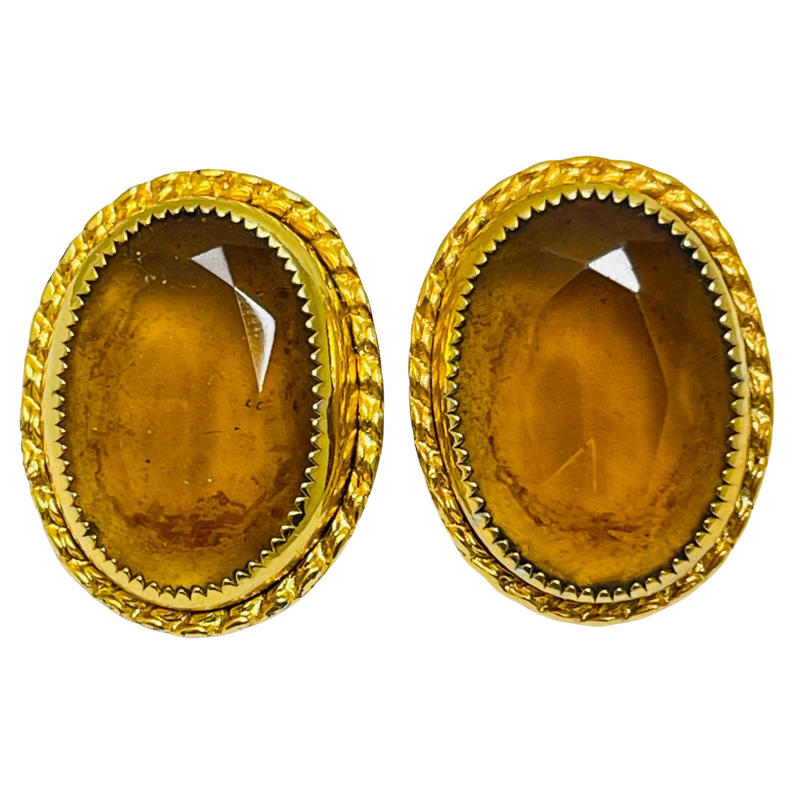 Vintage gold tone glass amber designer clip on earrings For Sale