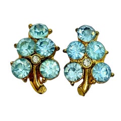 Orecchini vintage con pietre blu e vetro dorato con chiusura a vite