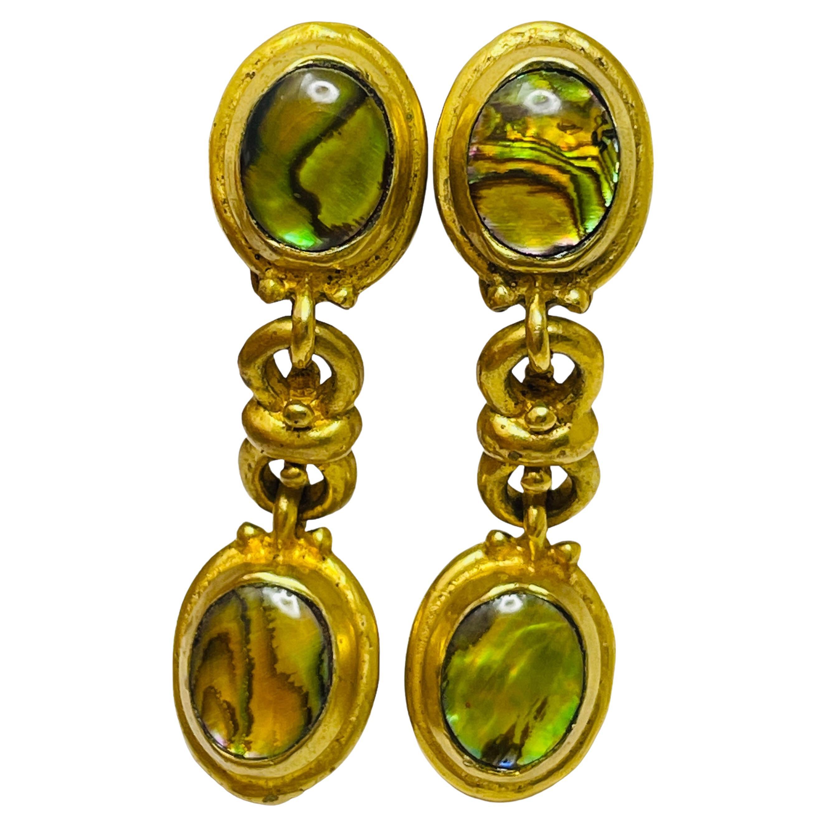 Orecchini a clip di design con pendenti in vetro dorato vintage