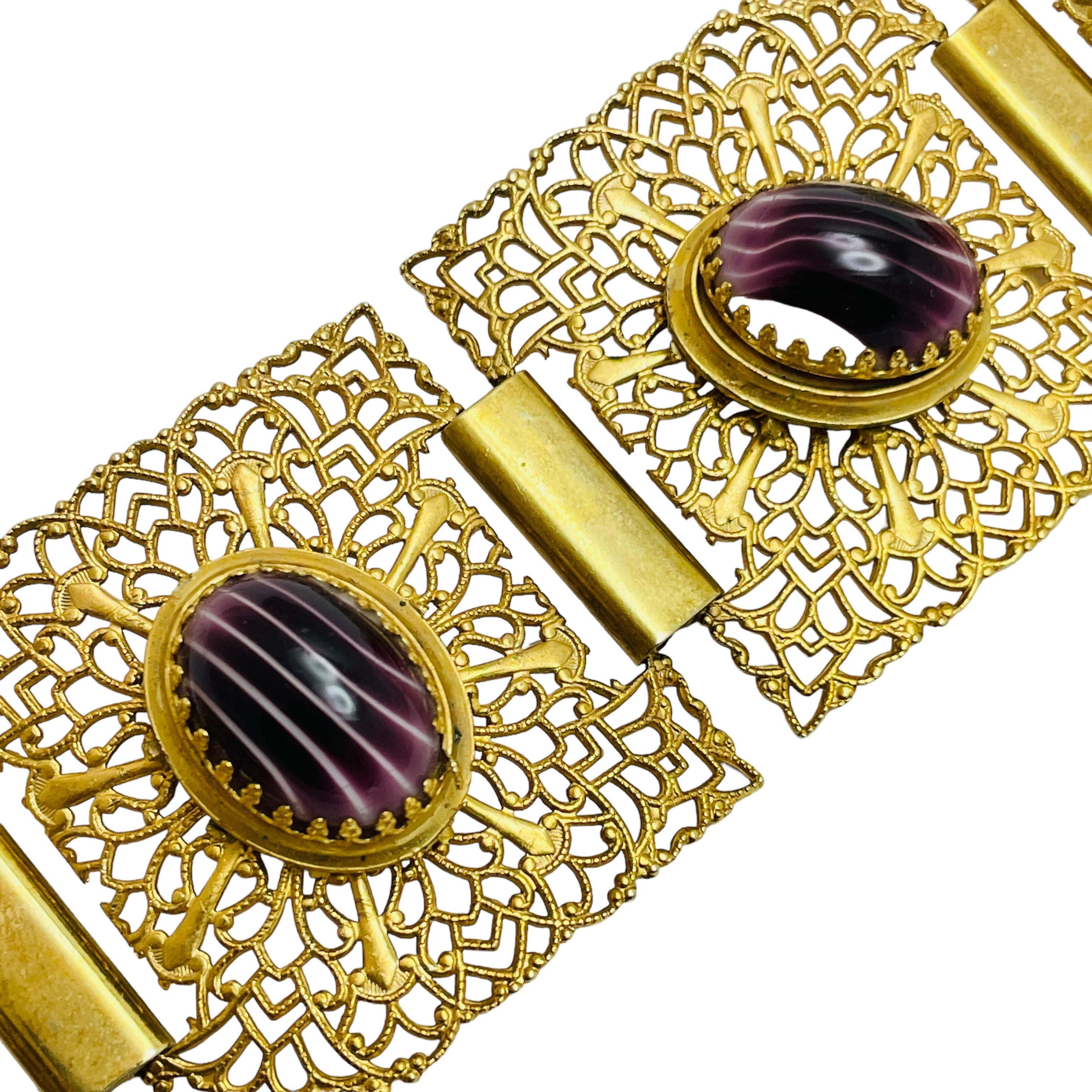 DÉTAILS

• non signé    

• ton or avec pierres de verre

• bracelet design vintage

MESURES  

• 

CONDITION

•  très bon état vintage avec peu de signes d'usure 

 Sku 45

❤️❤️  BIJOUX VINTAGE DE CRÉATEURS ❤️❤️

❤️❤️  ALEXANDER'S BOUTIQUE  ❤️❤️