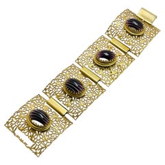 Breites Vintage-Designer-Armband aus goldfarbenem Glas