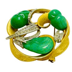 Vintage gold tone glass green jade rhinestone designer brooch