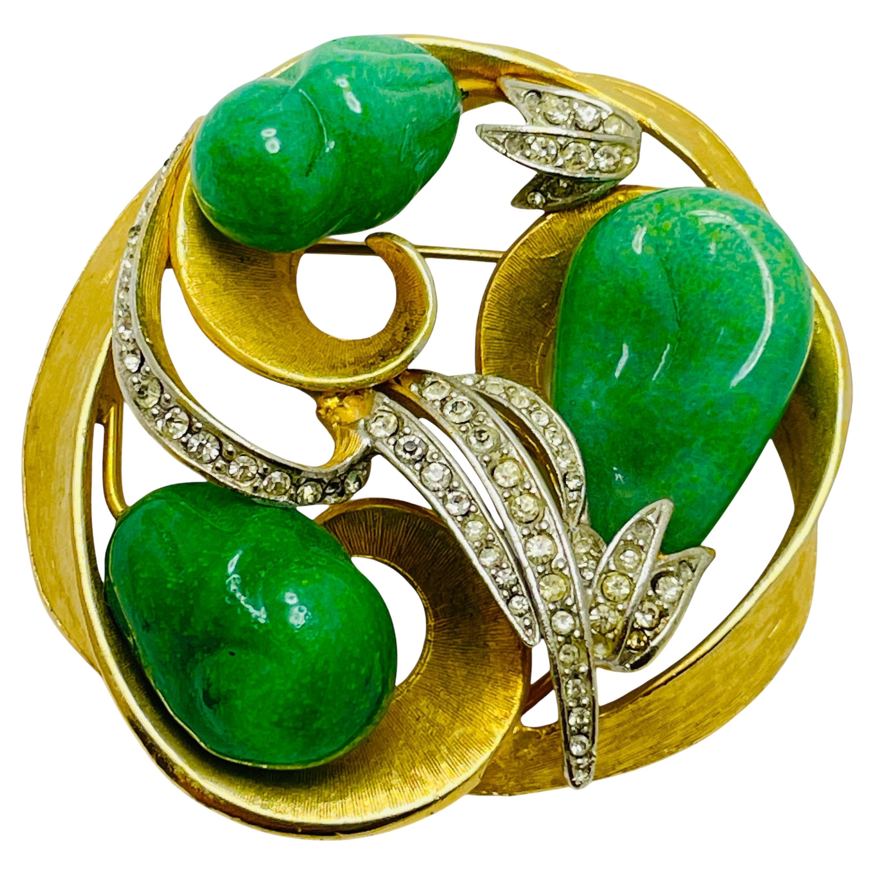 Vintage gold tone glass green jade rhinestone designer brooch For Sale