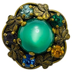 Broche pequeño checoslovaco vintage de piedras de cristal en tono dorado