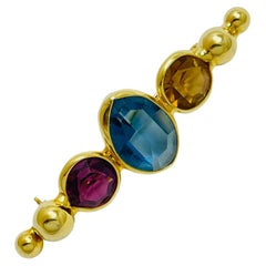 Retro gold tone glass stones designer brooch