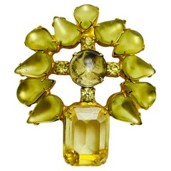 Broche vintage de diseño con piedras de cristal en tono dorado