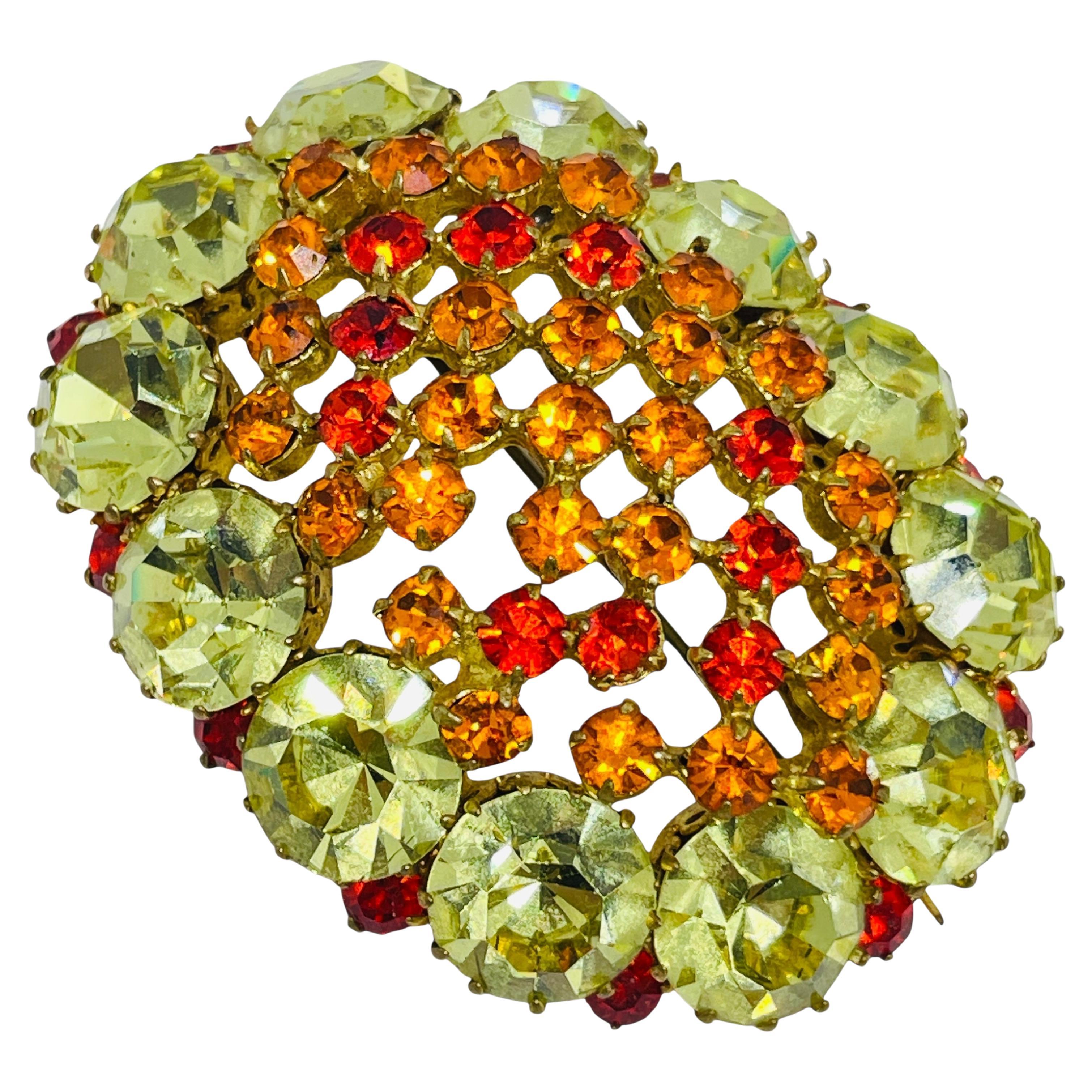 Broche de créateur vintage en pierres de verre dorées et massives