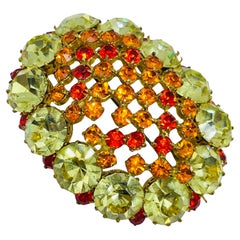 Broche de créateur vintage en pierres de verre dorées et massives