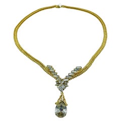 Collana vintage in vetro dorato con goccia a strappo