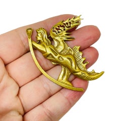 Vintage gold tone goddess designer brooch