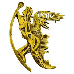 Vintage gold tone goddess designer brooch