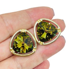 Vintage gold tone green crystal designer 80's clip on earrings