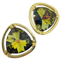 Orecchini a clip vintage anni 
80 di design con cristalli verdi dorati