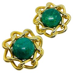 Vintage gold tone green glass cabochon designer clip on earrings