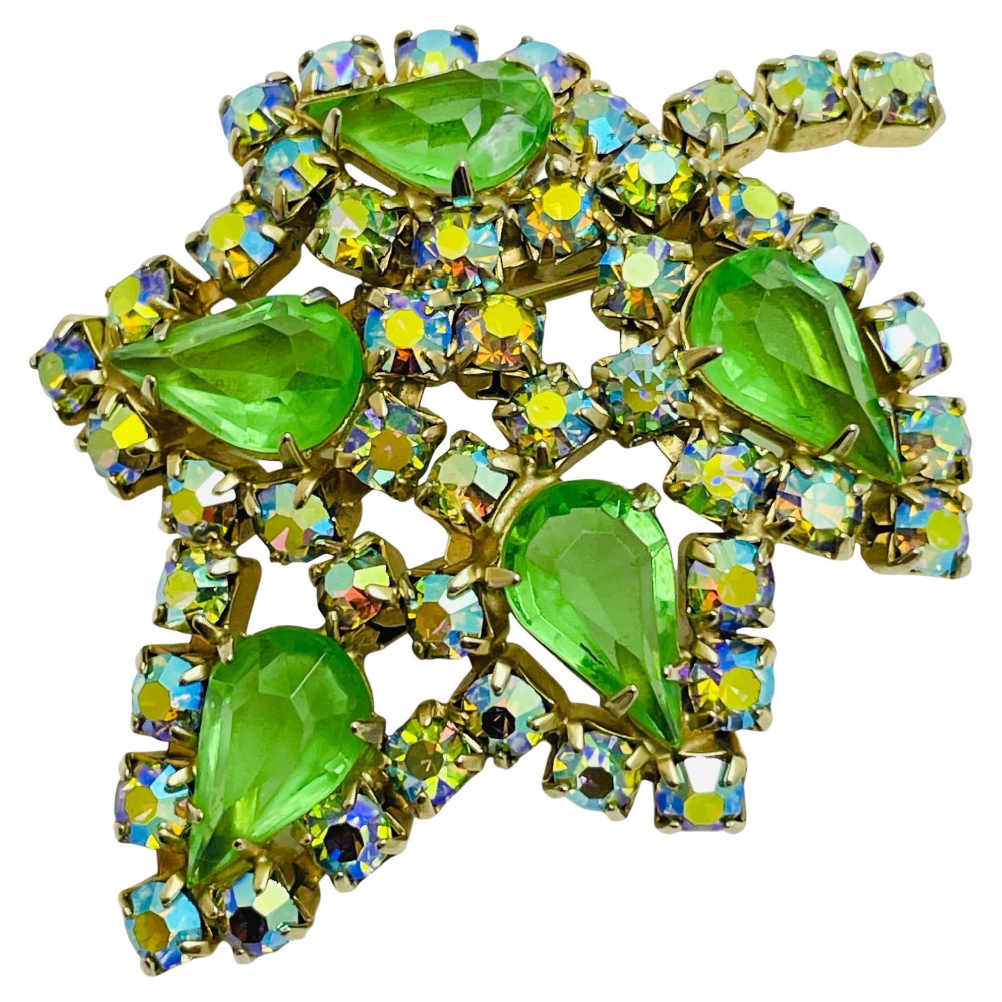 Vintage gold tone green glass designer brooch For Sale