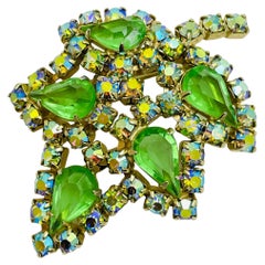 Broche vintage de cristal verde dorado de diseño