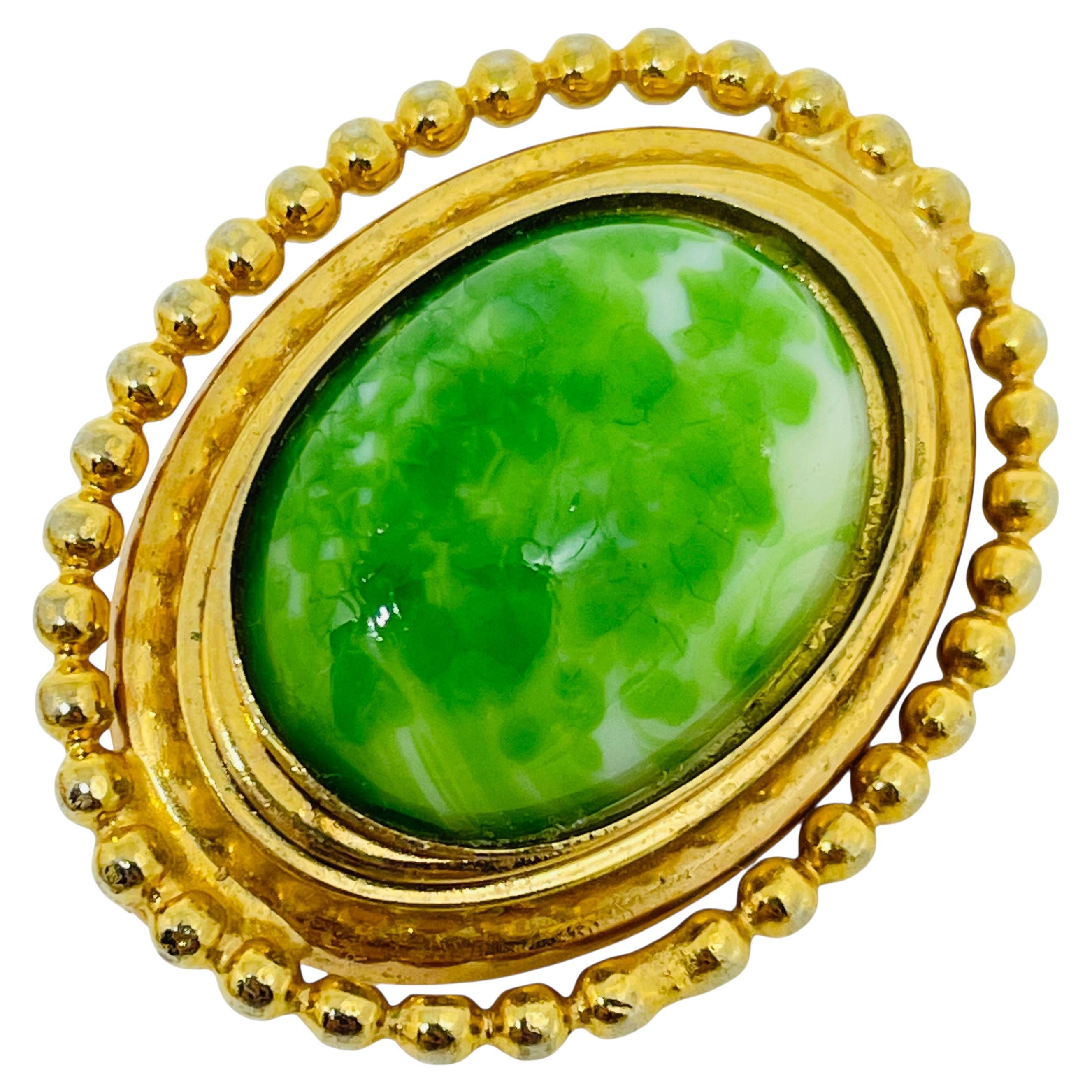 Vintage gold tone green glass designer brooch