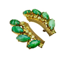 Vintage gold tone green glass rhinestone designer clip on earrings
