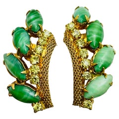 Vintage gold tone green glass rhinestone designer clip on earrings