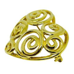 Vintage gold tone heart designer brooch