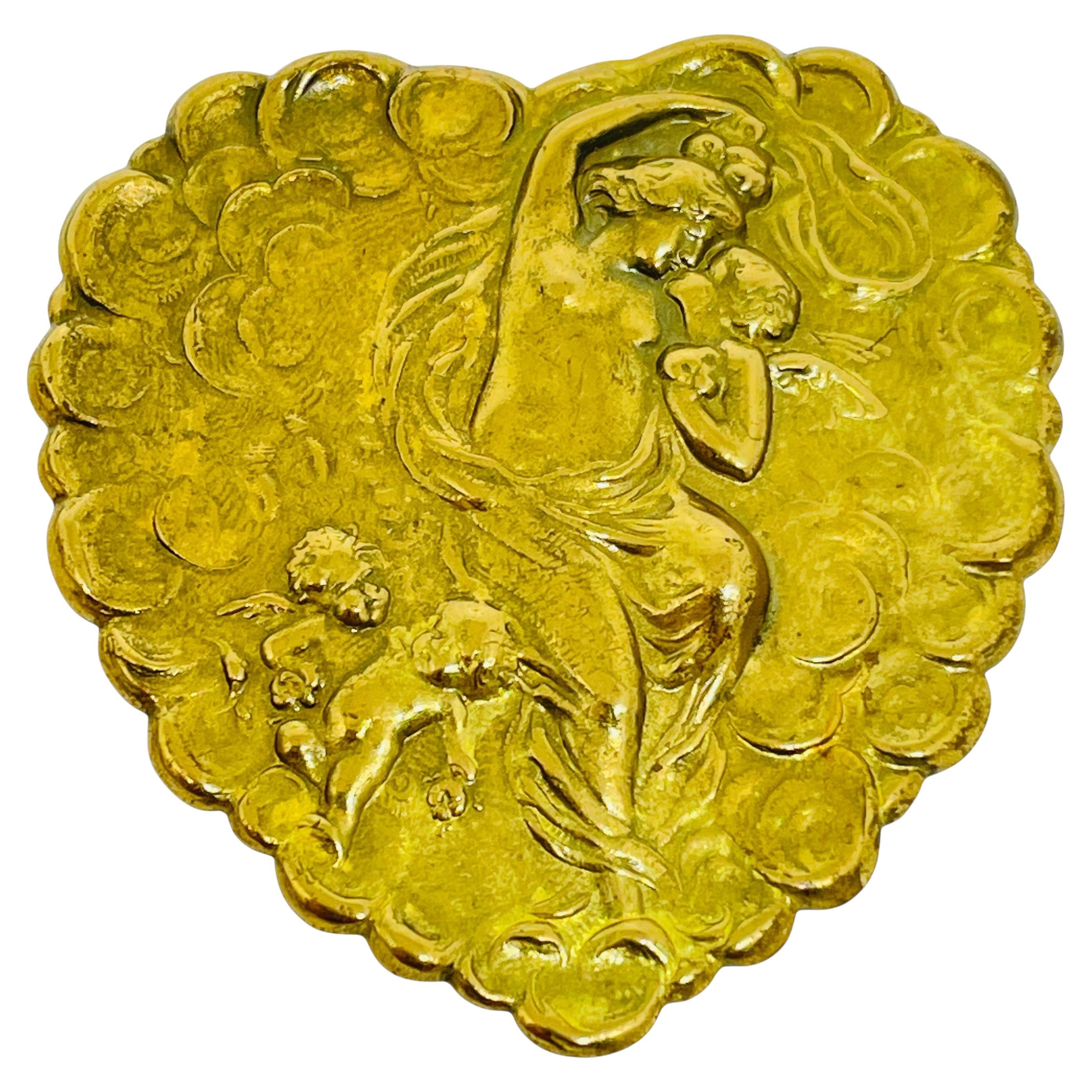 Vintage gold tone heart designer brooch