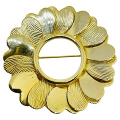 Vintage gold tone hearts circle designer brooch