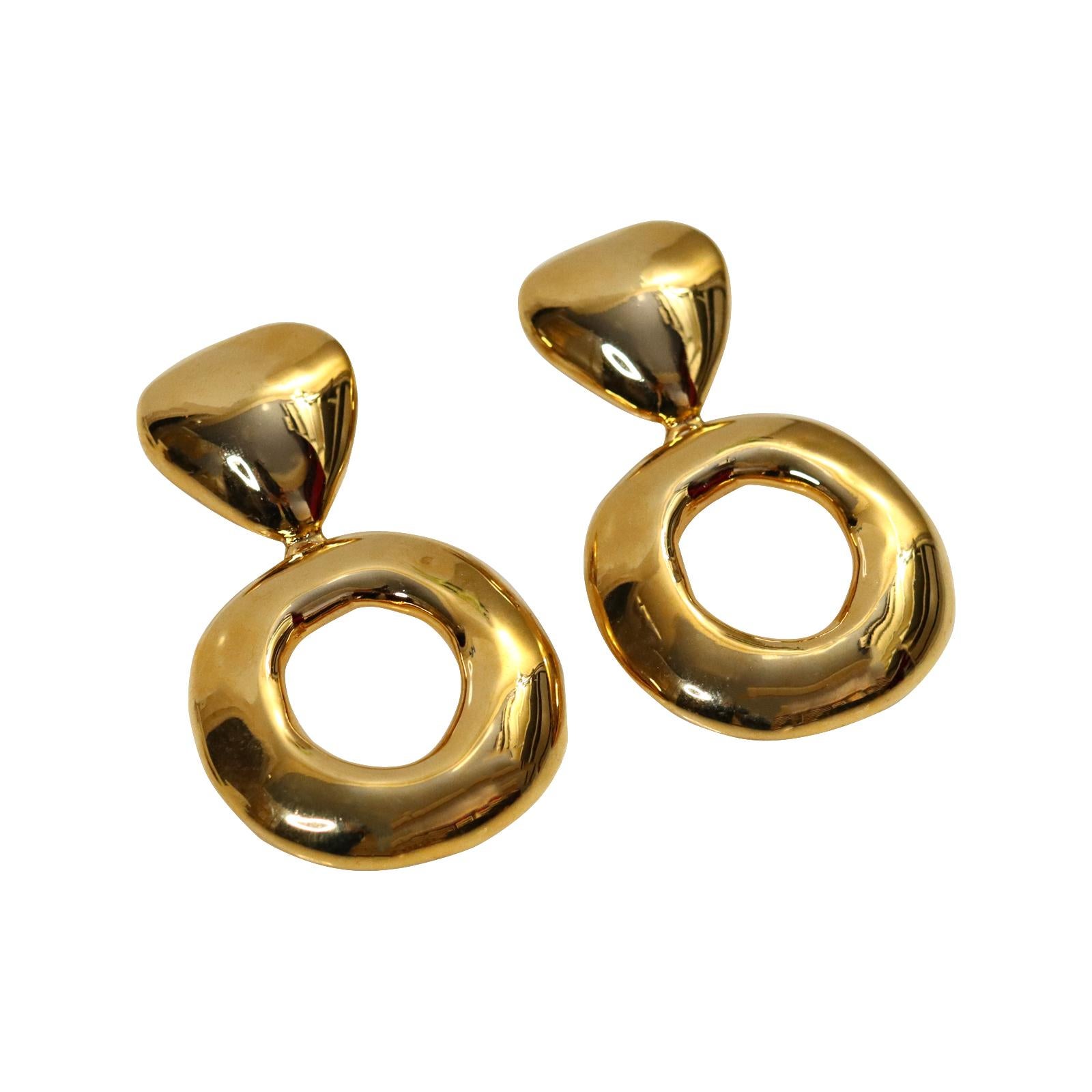 Vintage Gold Tone Hoop Earrings Circa 1980s.  These dangling gold hoops look so chic and stunning with everything.   So reminiscent of the 1980s.  Can you imagine wearing these with a t-shirt, shorts, jeans, or a strapless dress? These will be in