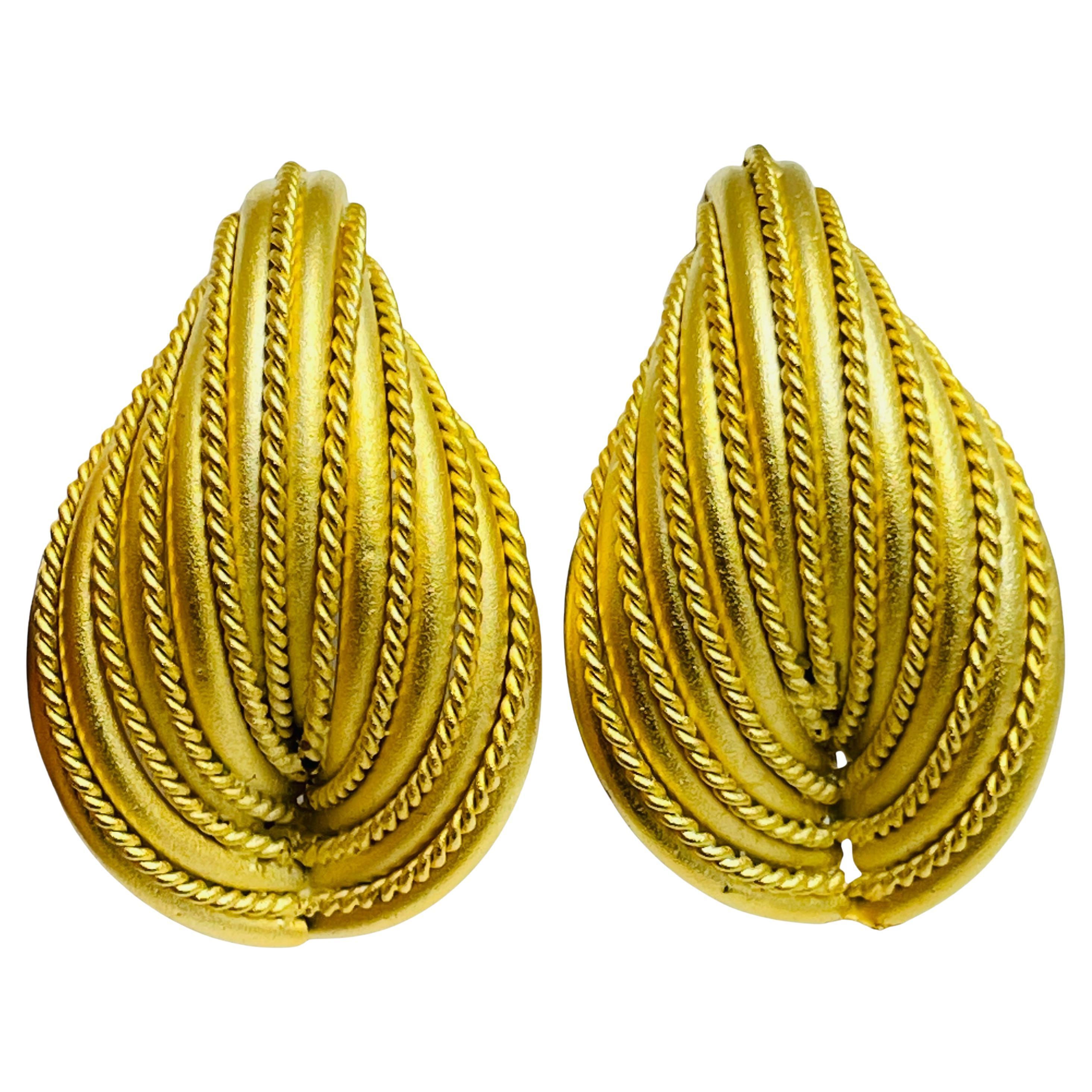 Vintage gold tone huge designer clip on earrings