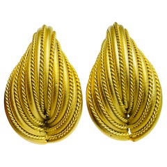 Vintage gold tone huge designer clip on earrings