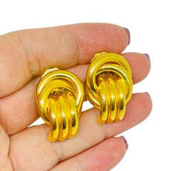 Vintage gold tone knot door knocker style designer 80's clip on earrings