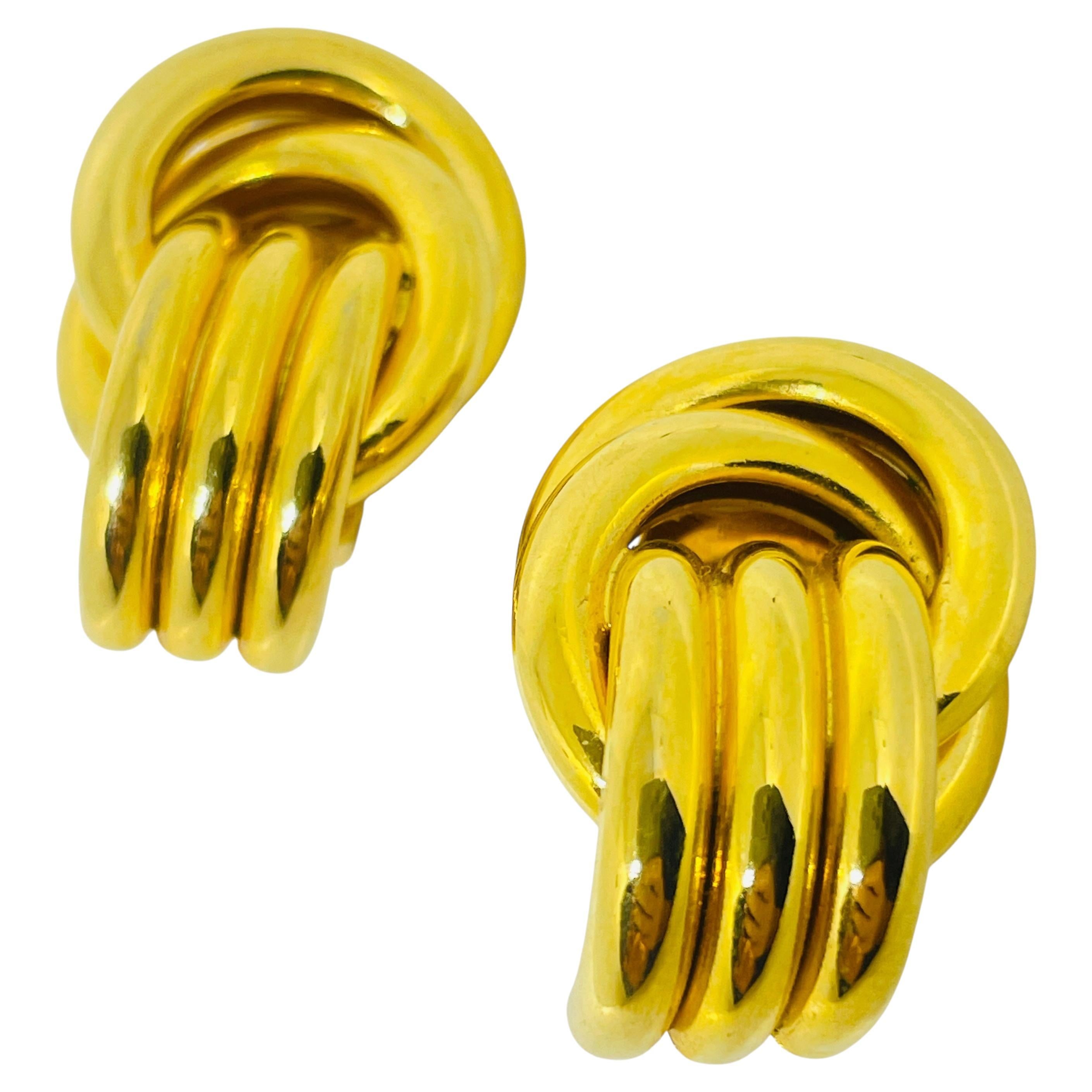 Orecchini a clip vintage anni '80 con nodo d'oro in stile battiporta di design