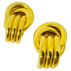 Orecchini a clip vintage anni '80 con nodo d'oro in stile battiporta di design