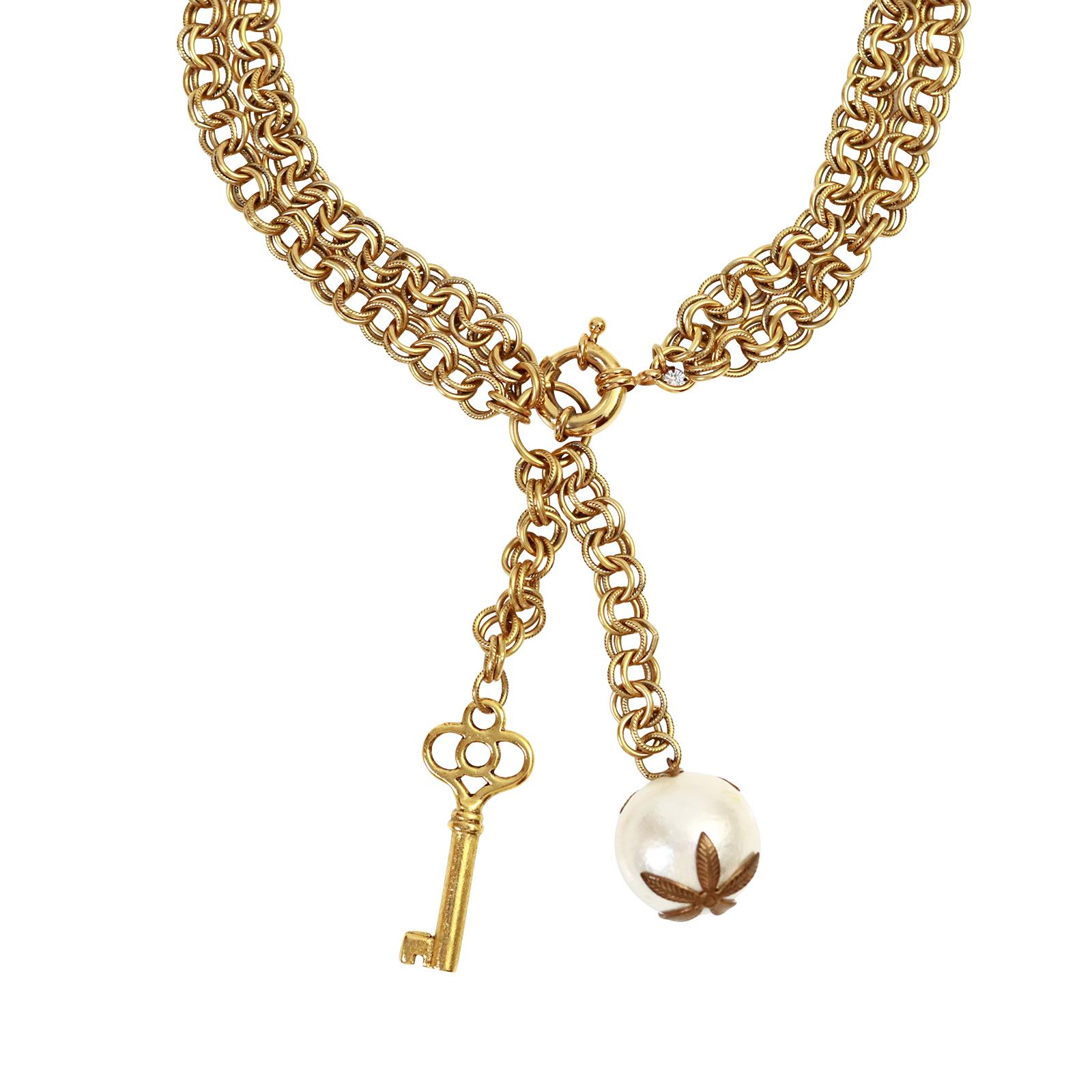 Vintage Gold Tone Lariat Drop Key and Faux Pearl Necklace Circa 1980's In Good Condition For Sale In New York, NY