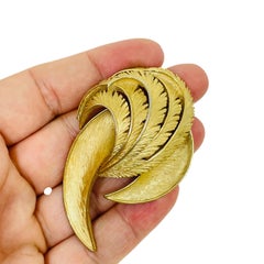 Vintage gold tone leaf designer brooch