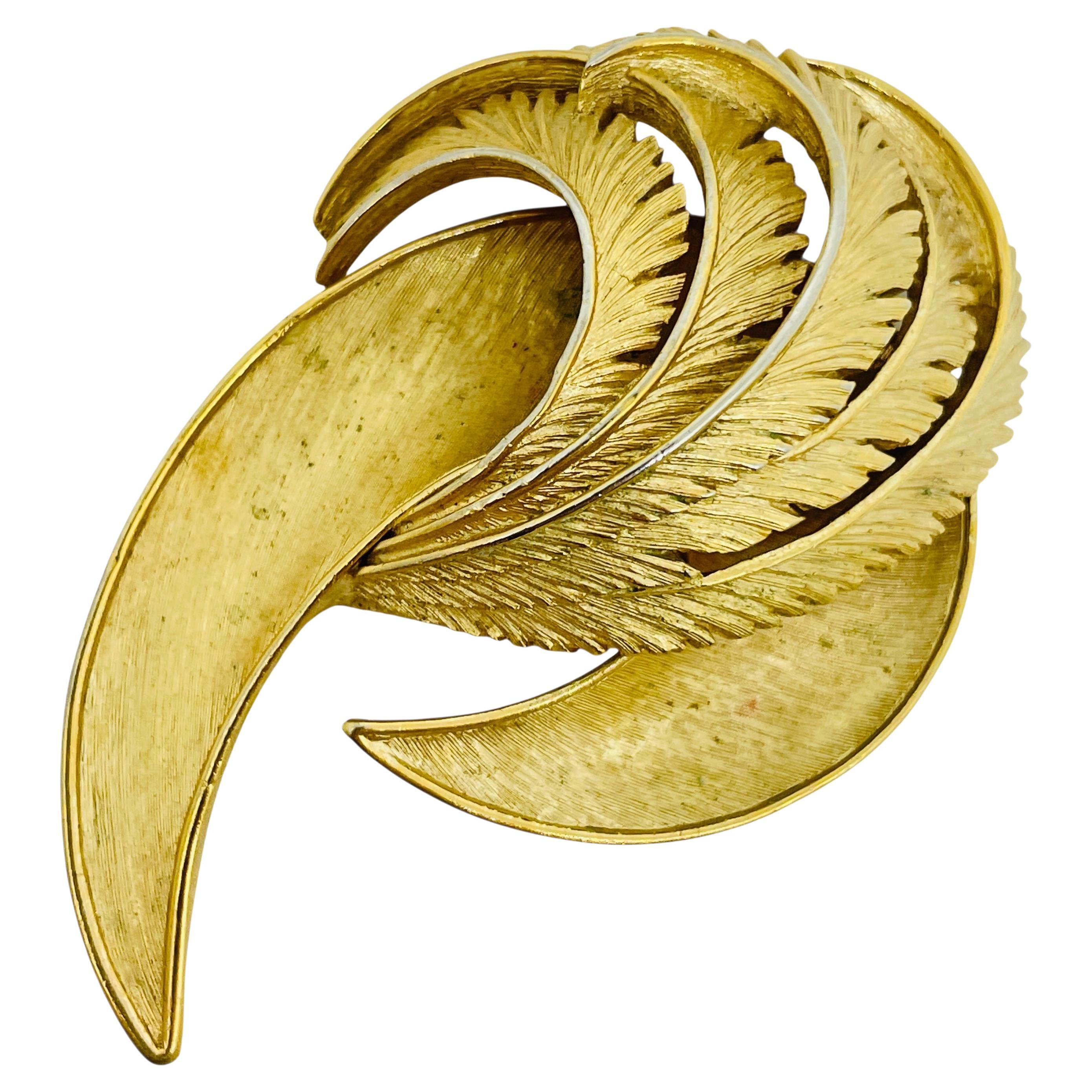 Vintage gold tone leaf designer brooch