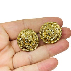 Vintage gold tone lions head designer clip on earrings