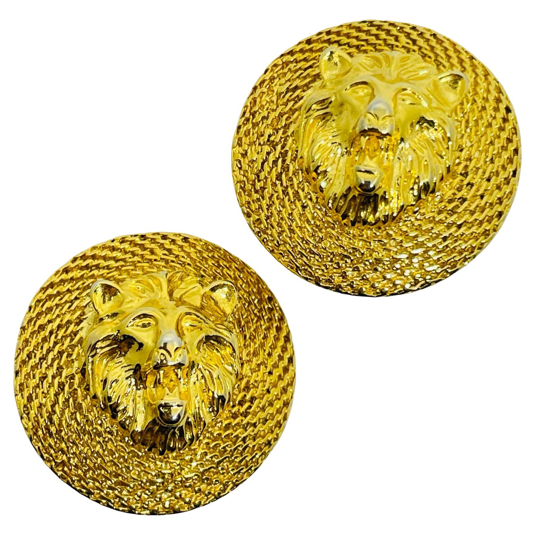 Vintage gold tone lions head designer clip on earrings
