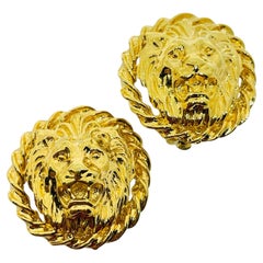 Vintage gold tone lions head designer clip on earrings