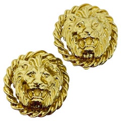 Vintage gold tone lions head designer clip on earrings