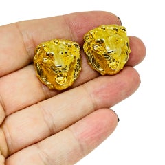 Vintage gold tone lions head designer pierced earrings