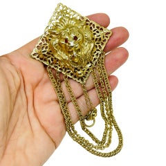 Vintage gold tone lions head ruby red rhinestone eyes chain designer brooch