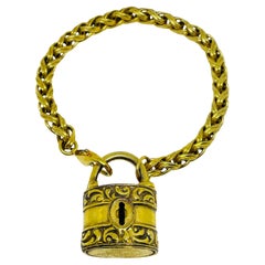 Vintage gold tone lock charm chain designer bracelet