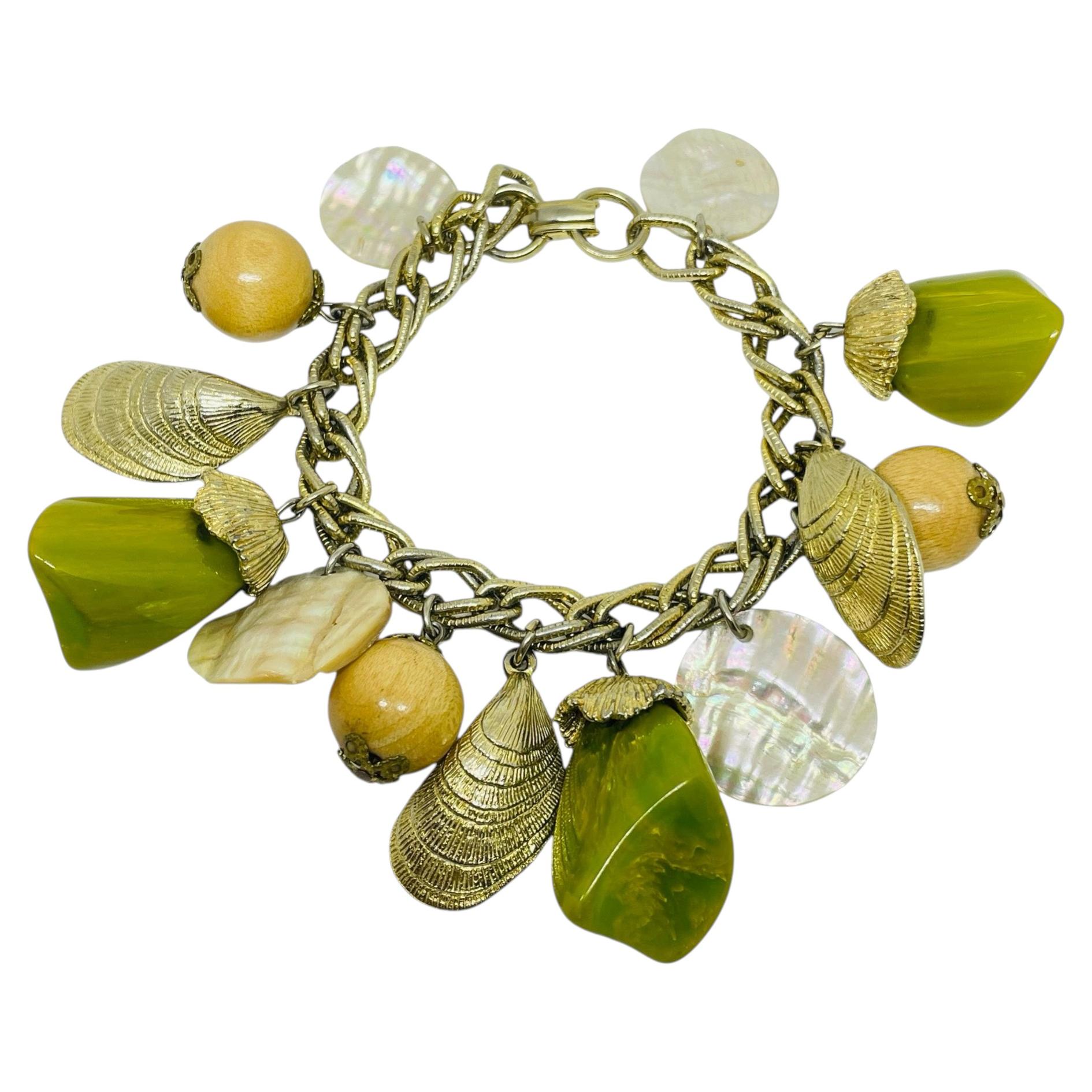Vintage gold tone lucite wood charms designer chain bracelet For Sale
