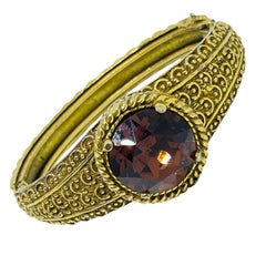 Vintage gold tone massive amber glass stone designer bracelet