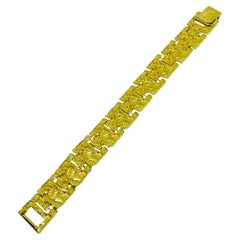 Pulsera vintage de diseño de eslabones macizos en tono dorado