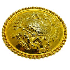 Vintage gold tone massive lions crown shield designer brooch