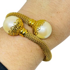 Vintage gold tone mesh chain faux pearl wrap designer bracelet