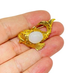 Vintage gold tone milk glass fish figural designer brooch