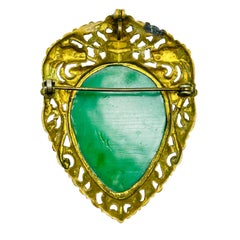 Vintage gold tone molded resin green jade designer brooch